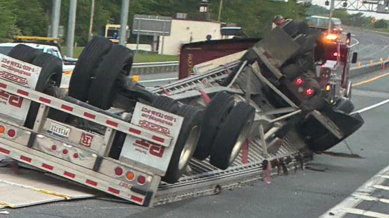Tractor trailer overturns on Thruway after State Police say man was ...