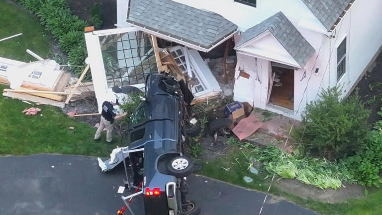 Driver dead after pickup truck slams into front of South Shore home