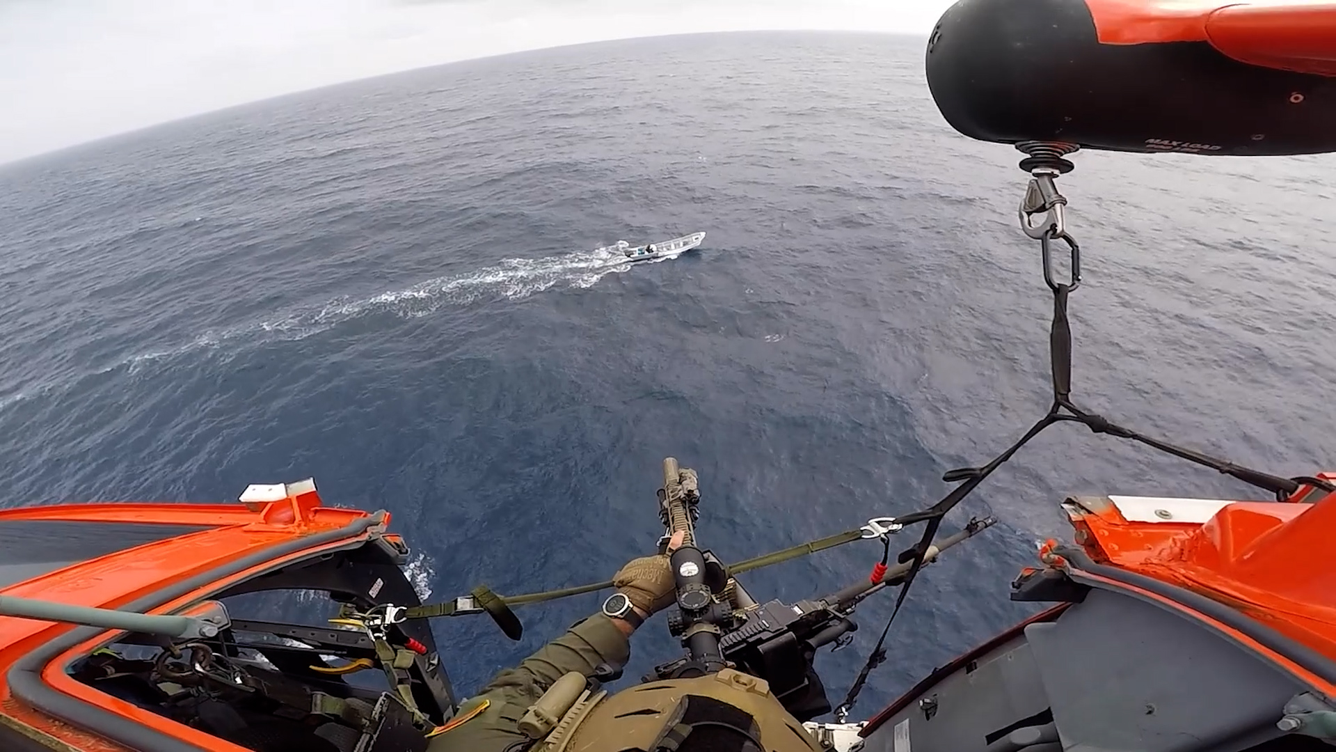 Dramatic scenes as US Coast Guard fire sniper shots at drug boat