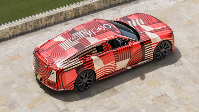 Jaguar's big electric sedan loses the bulky camo for a slinky wrap