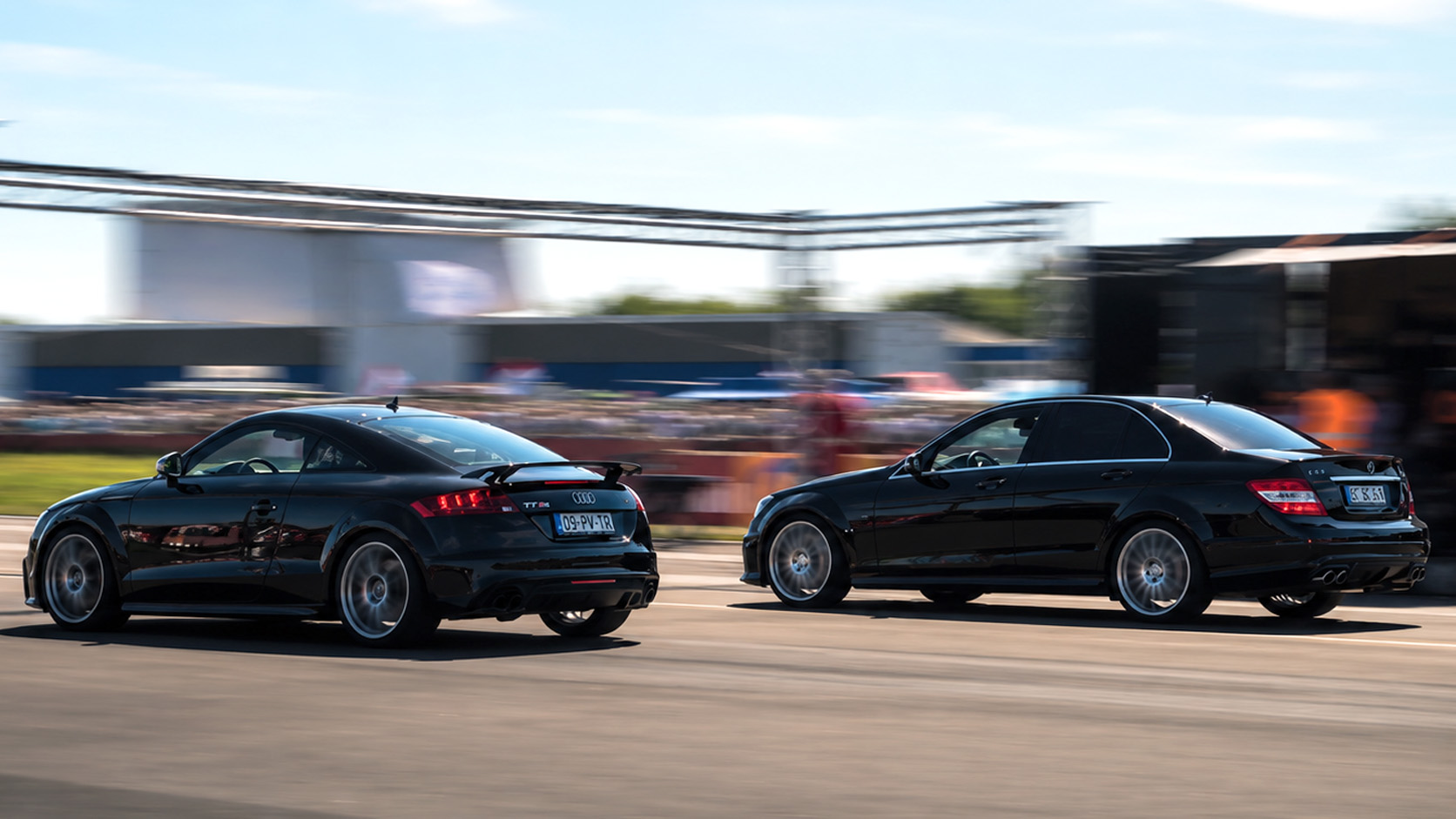 Which is faster in a drag race, Audi TT RS or Mercedes C63 AMG?
