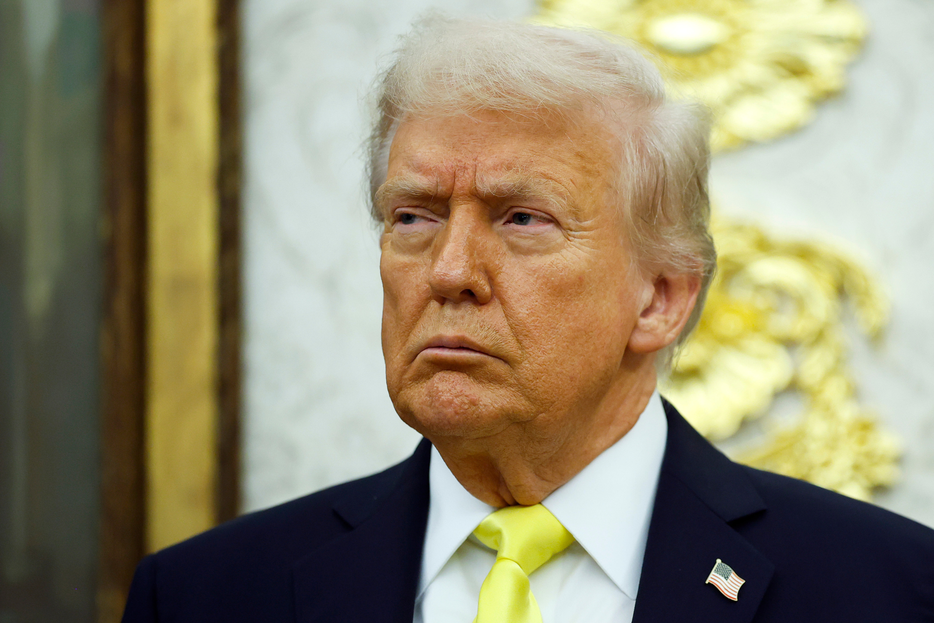Donald Trump looks on during a press conference in the Oval Office of the White House on October 15, 2025 in Washington, DC.