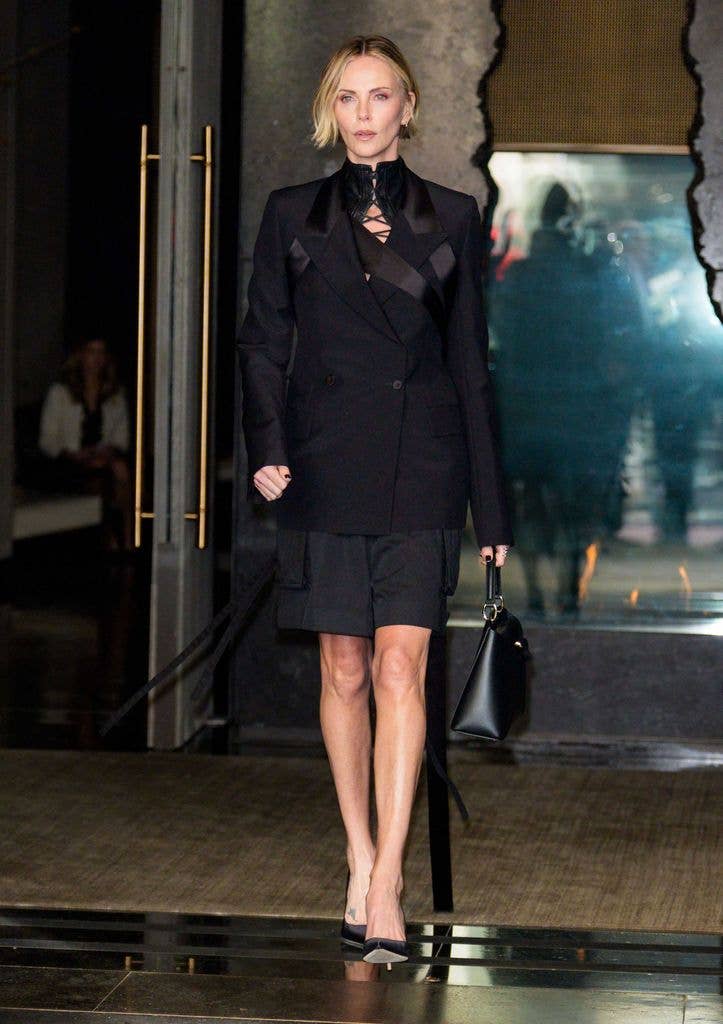 Charlize Theron wearing shorts