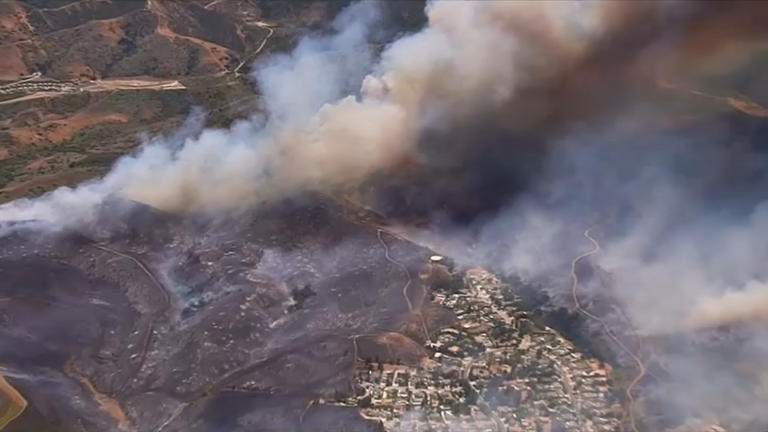 Sandy Fire evacuations remain in effect as firefighters make overnight ...