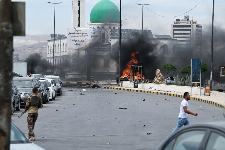 Car bomb explodes near Defense Ministry building in Damascus