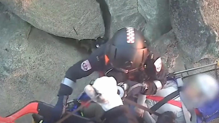 Moment climber rescued after horror 8m fall