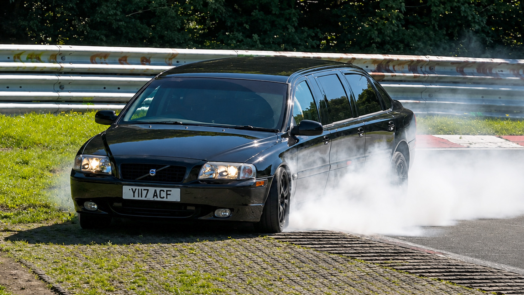 Limousine brake failure sends it off track in a cloud of smoke