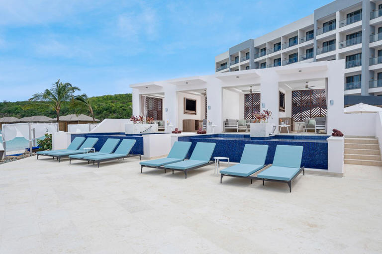 This adults-only all-inclusive Caribbean resort has chic overwater ...
