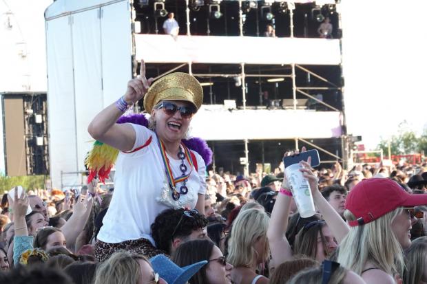 Stars perform to 100,000-strong crowd as festival returns after 21 years