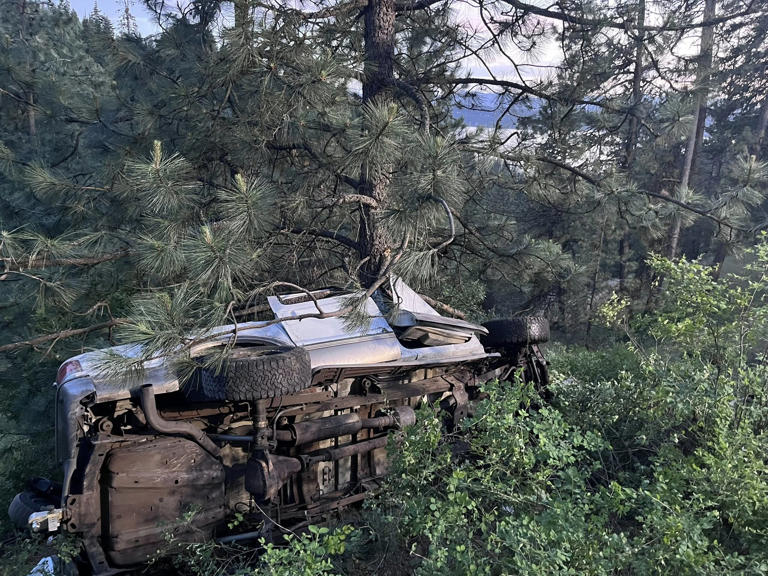 Photos: Driver trapped after car goes over embankment on I-90 in Idaho