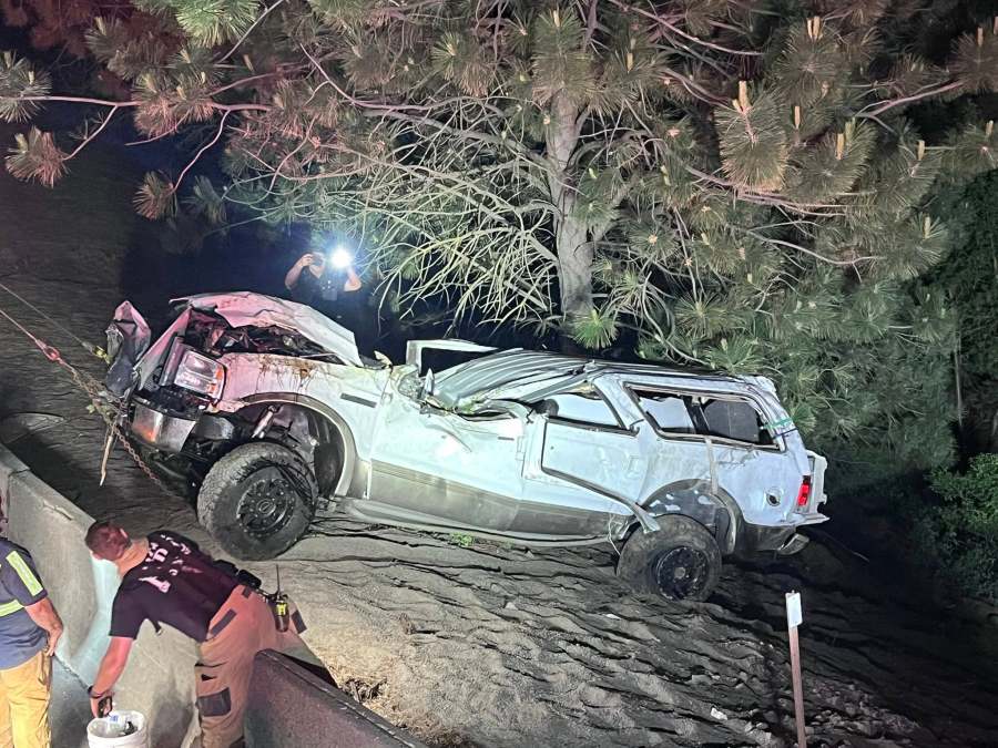 Photos: Driver trapped after car goes over embankment on I-90 in Idaho