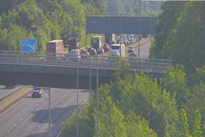 Man found dead in vehicle on M80 as emergency services called to busy ...