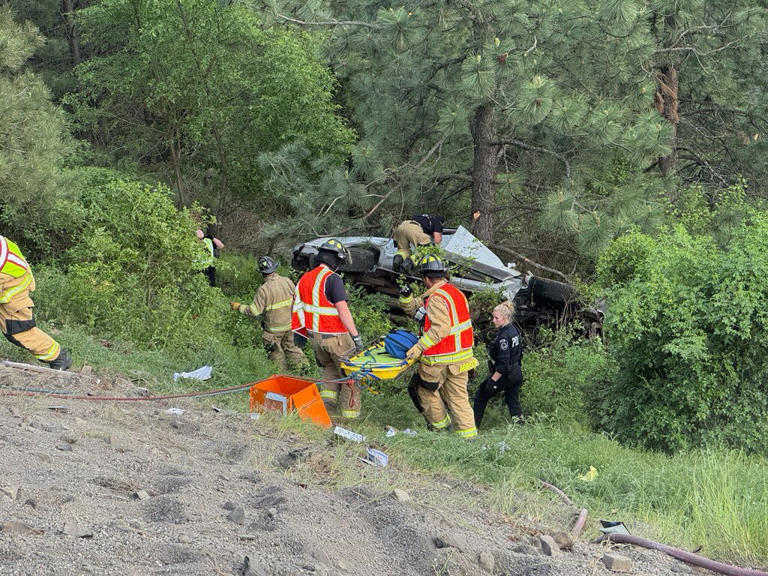 Photos: Driver trapped after car goes over embankment on I-90 in Idaho