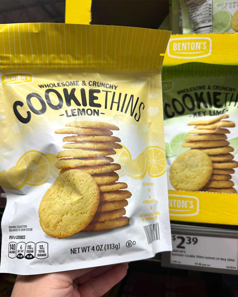 Someone holding Lemon Cookie Thins.