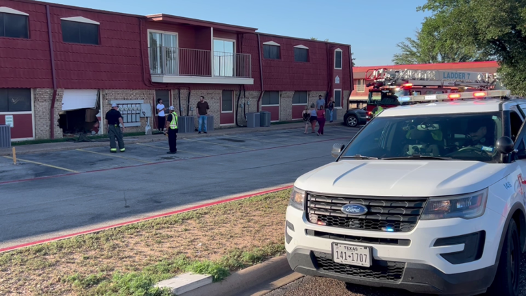 Multiple people injured after vehicle crashes into apartment building