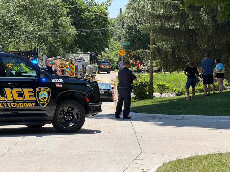 Crews battle Bettendorf house fire, 1 firefighter taken to hospital