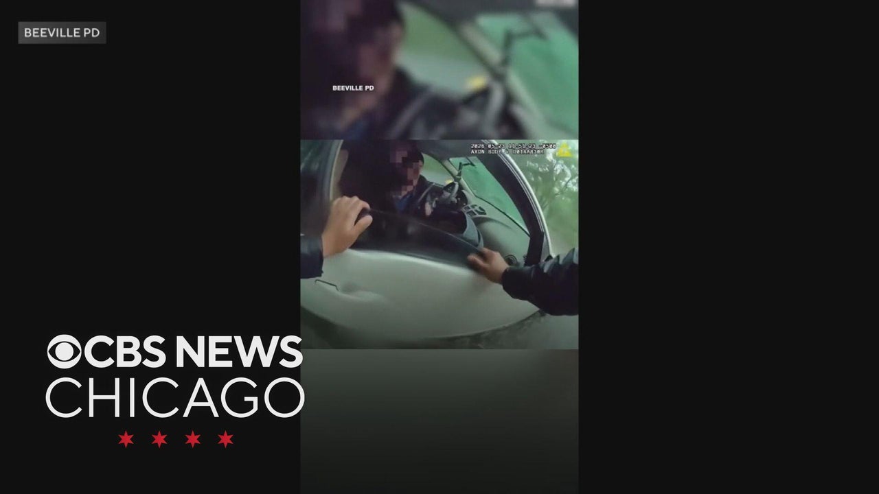 Officer saves baby from flooded car in Texas