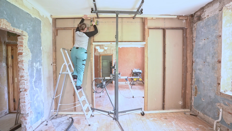 I tore down the old apartment walls to restore the original structure ...