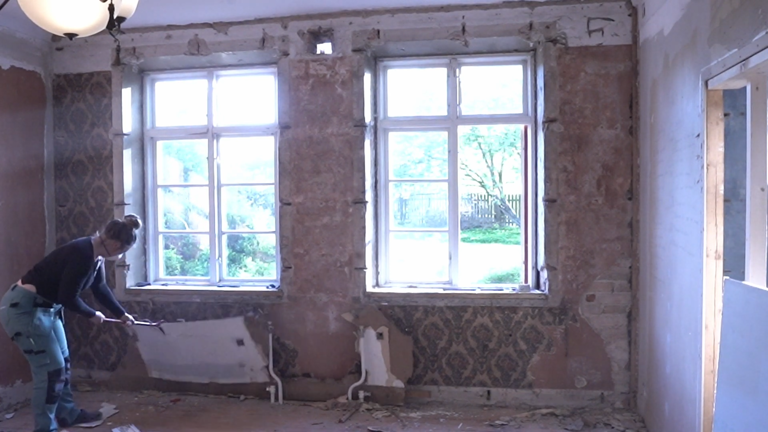 I tore down the old apartment walls to restore the original structure ...