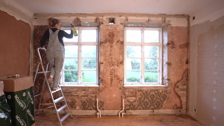 I tore down the old apartment walls to restore the original structure ...