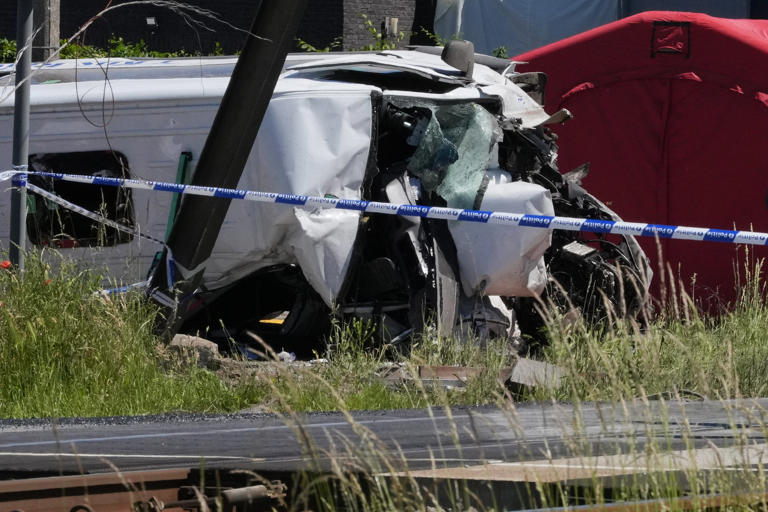 Four dead and five injured after train collides with school bus