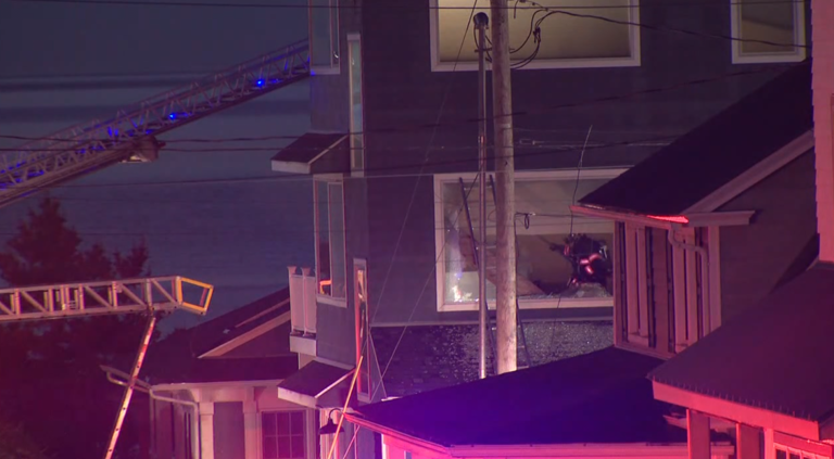 Man escapes after smoke detectors warn of heavy fire in Milford home