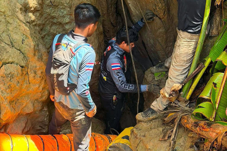 Rescuers race to save 7 people trapped in flooded cave for 6 days after ...