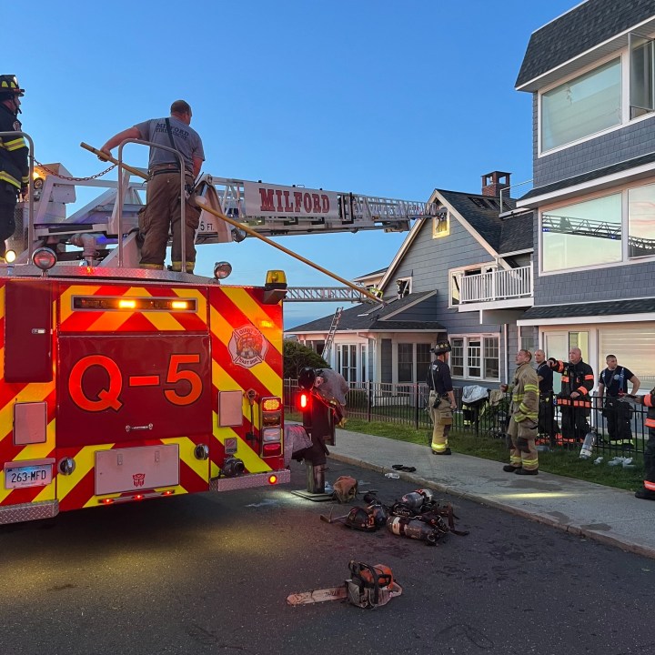 Man escapes after smoke detectors warn of heavy fire in Milford home