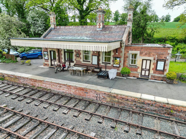 Couple spend £50k turning abandoned train station into retreat
