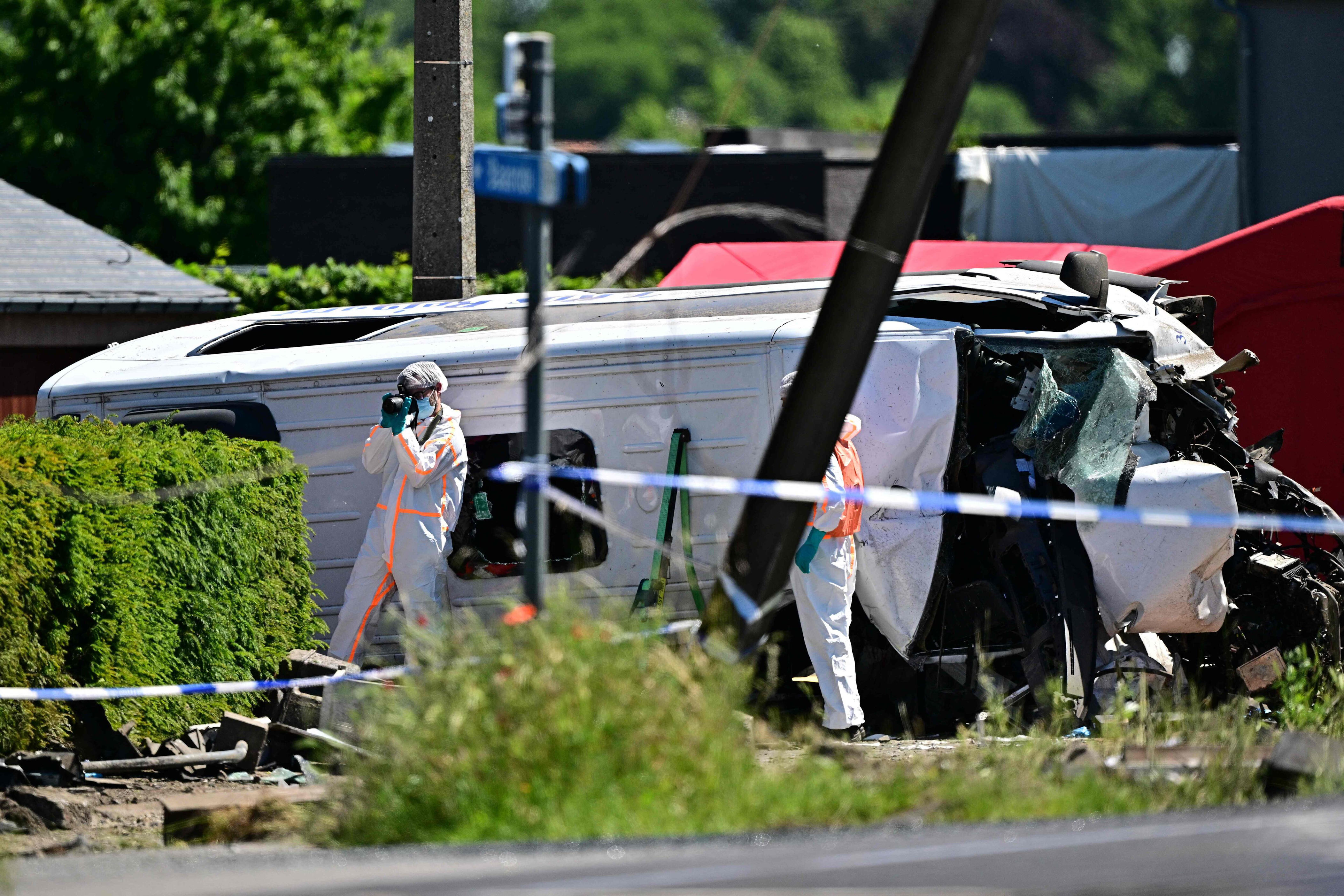 Four dead after train collides with school bus in Belgium