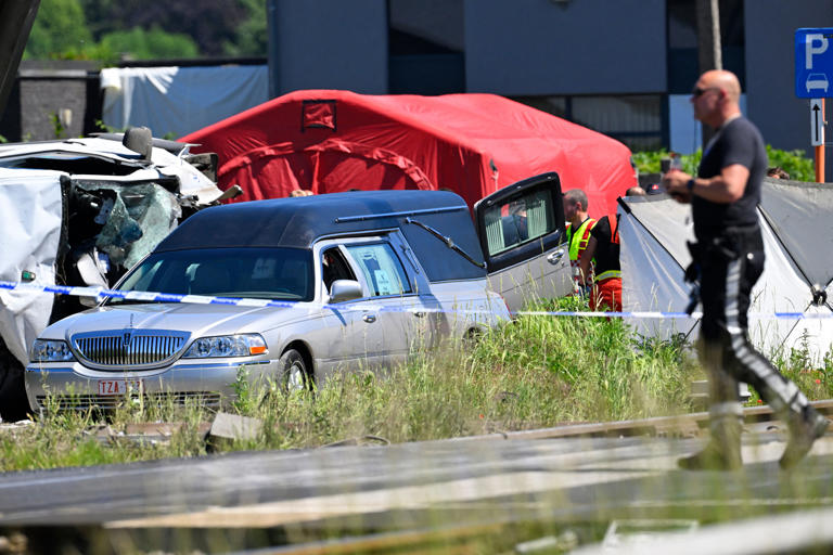 Four dead and five injured after train collides with school bus