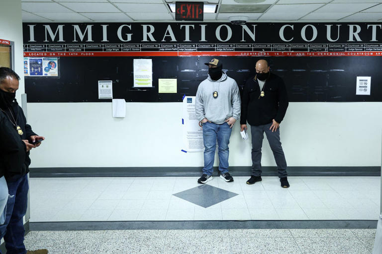 Immigration court hearings pack in 100 people to speed up deportations