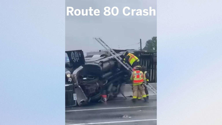 Overturned tractor-trailer crushes car on NJ highway, injuring both drivers