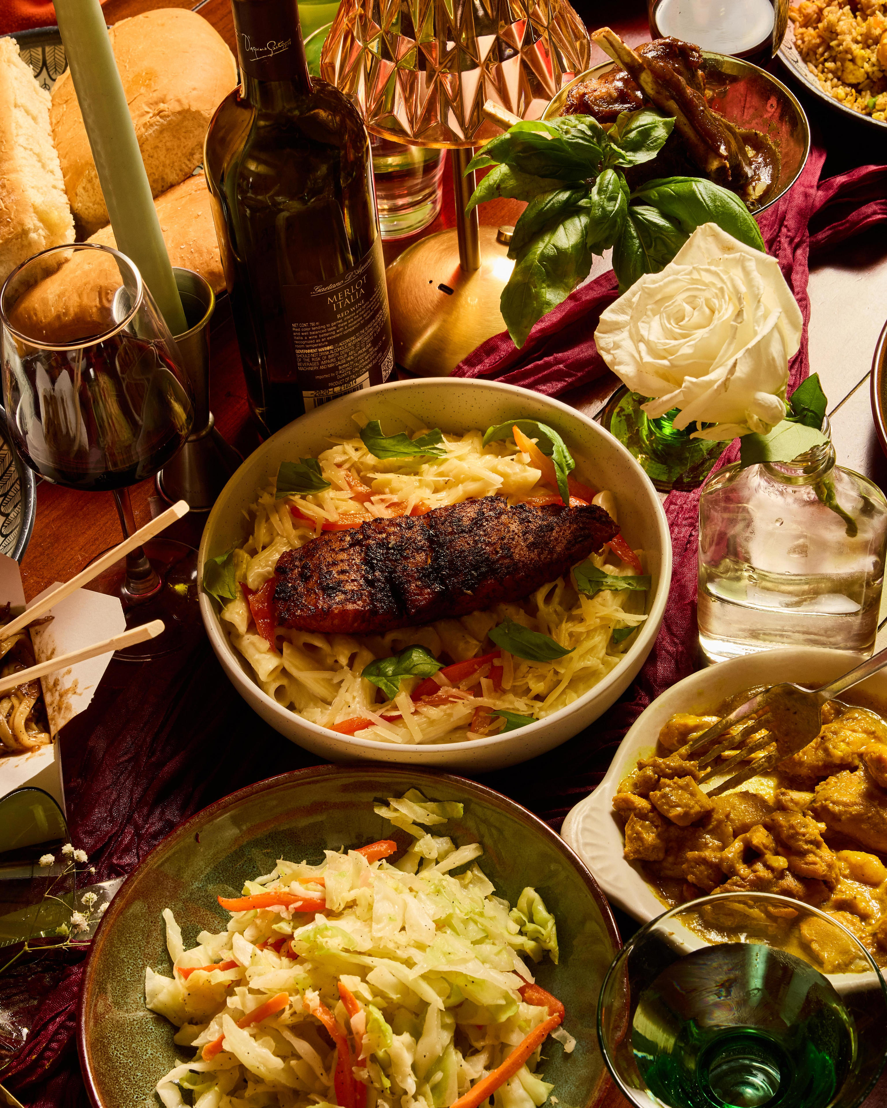 A tableful of Jamaican-Chinese dishes from ABL Hollywood.