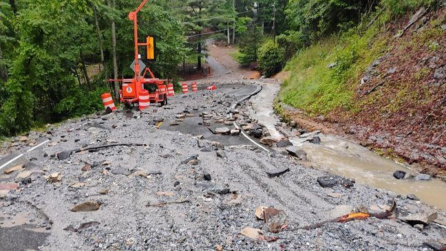 Heavy rain washes out roads overnight in Buncombe, Henderson counties
