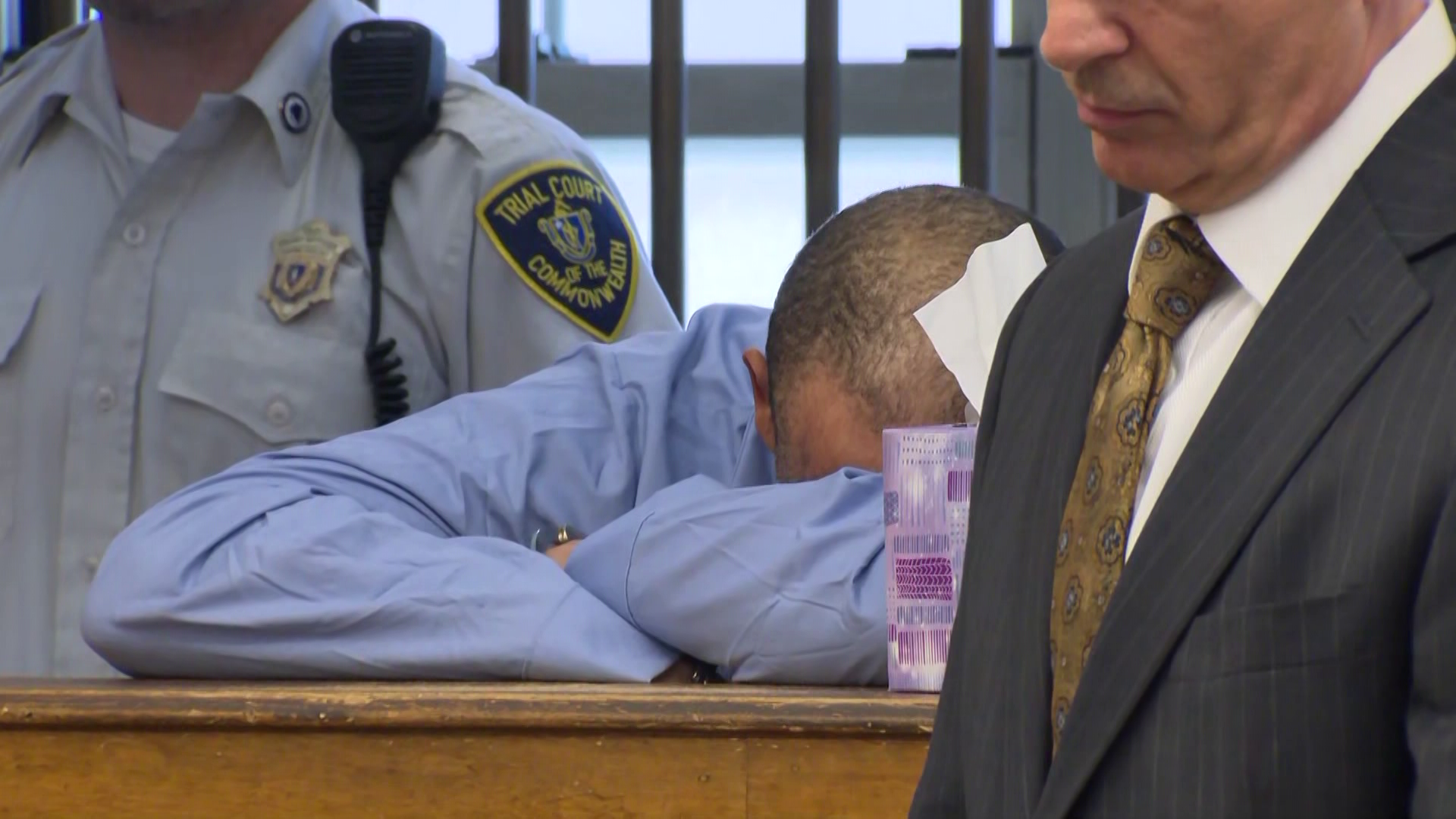 Man cries in court as he's charged in shooting death of wife