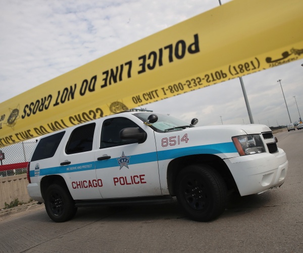 Trump blasts Chicago after 5 cops hurt in chaos