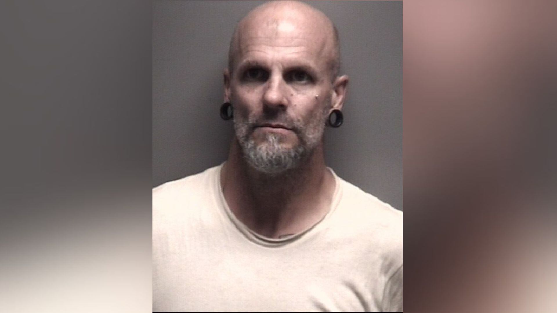 Wilmington man charged with breaking into garage, stealing firearms
