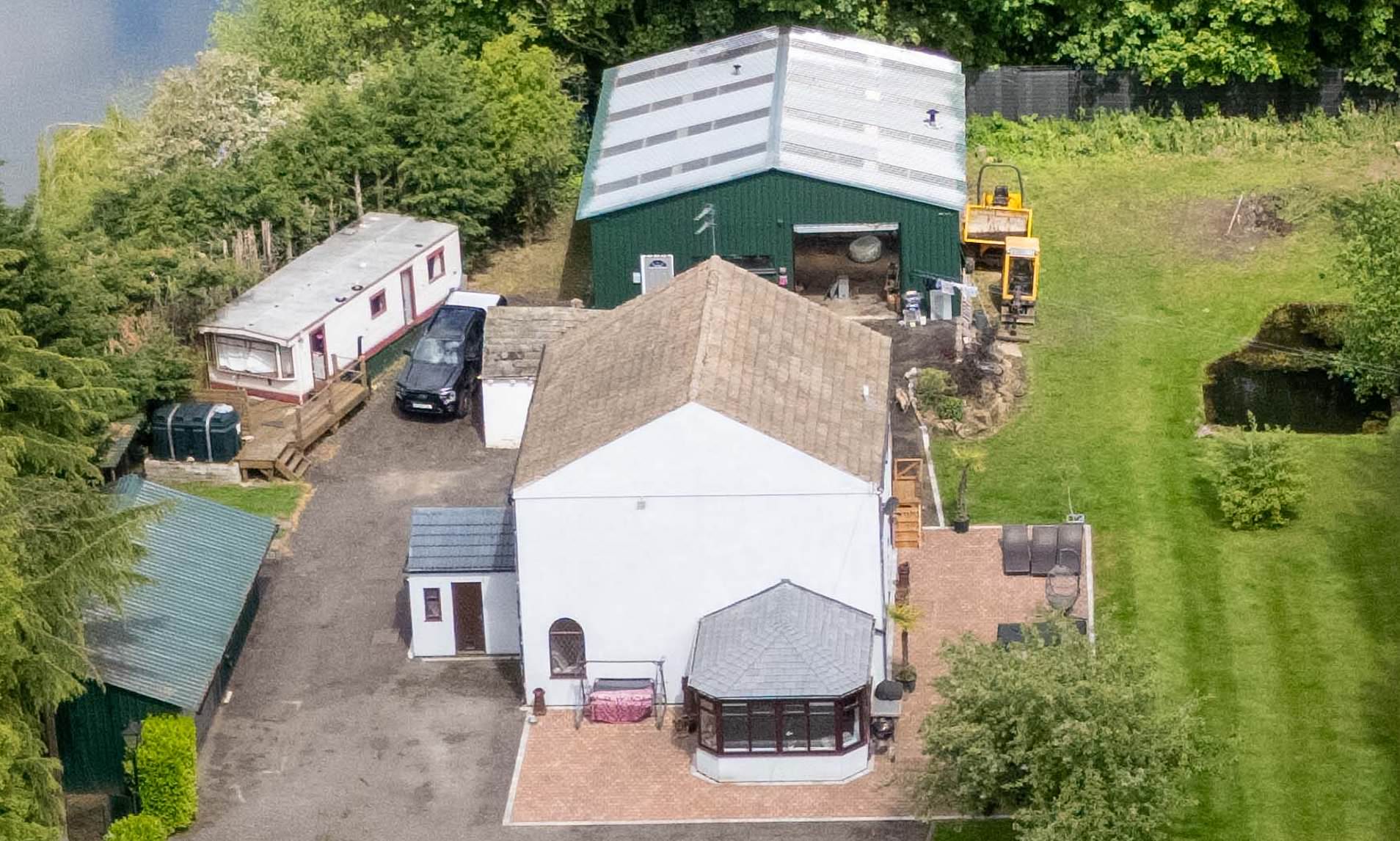 Family who built huge 'flood survival shed' are ordered to tear it down