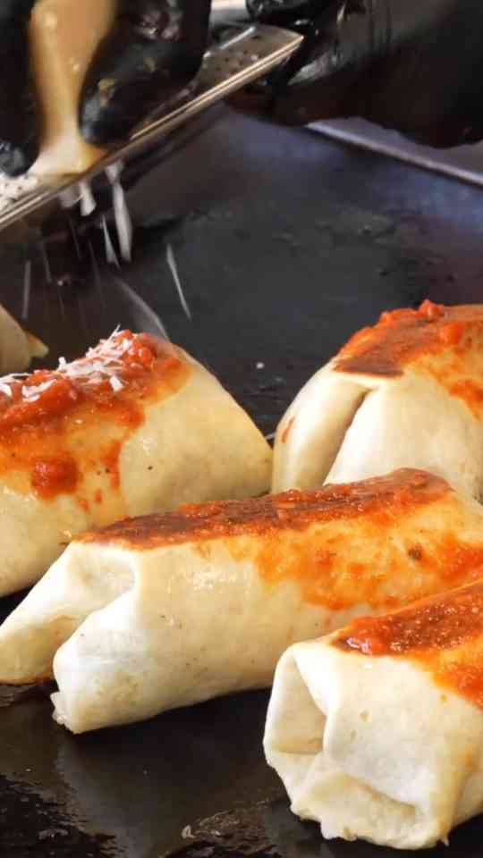 Finishing steps for the perfect Blackstone-cooked Italian burrito