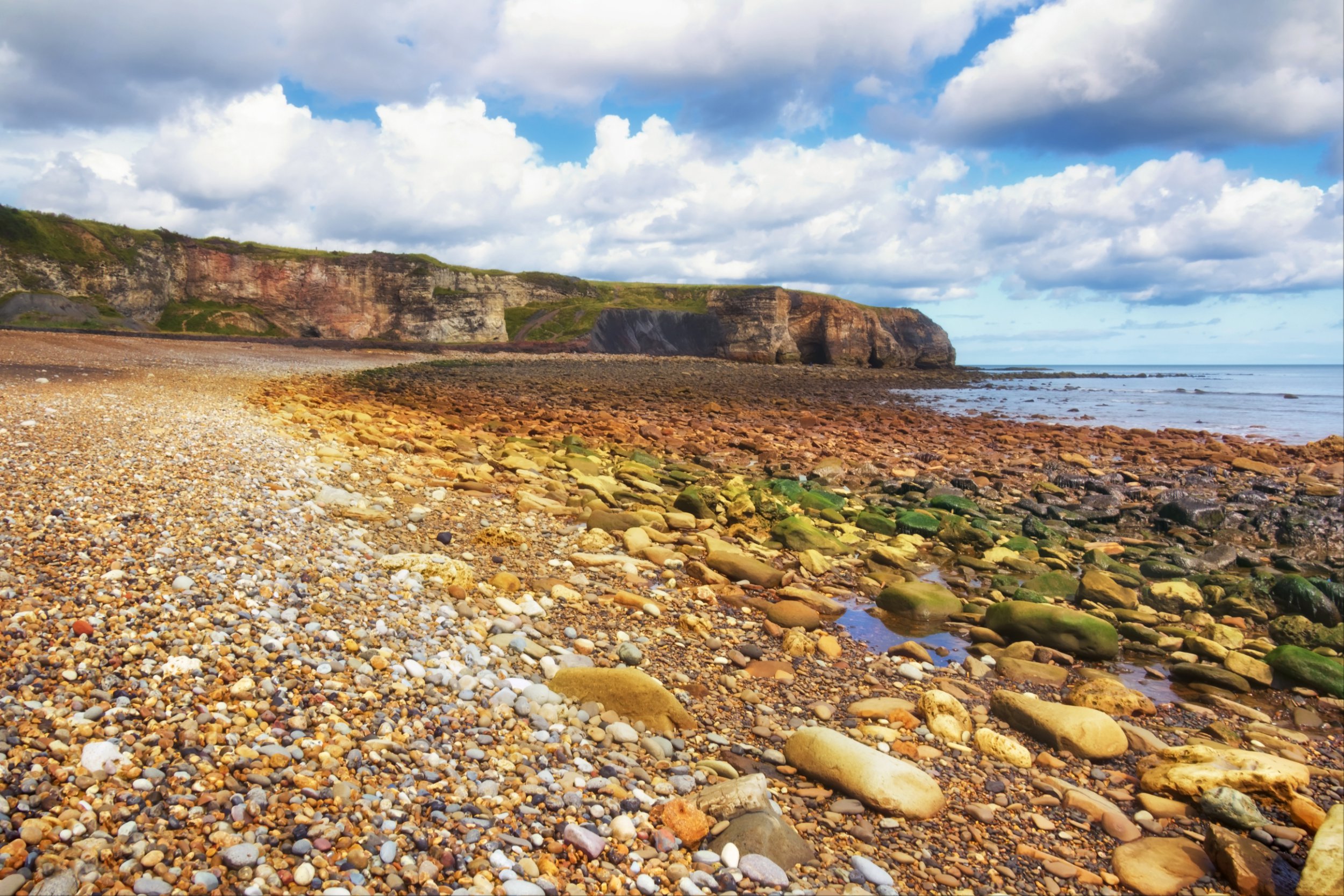 The historic harbour town with scenic walking routes and a buzzing food ...