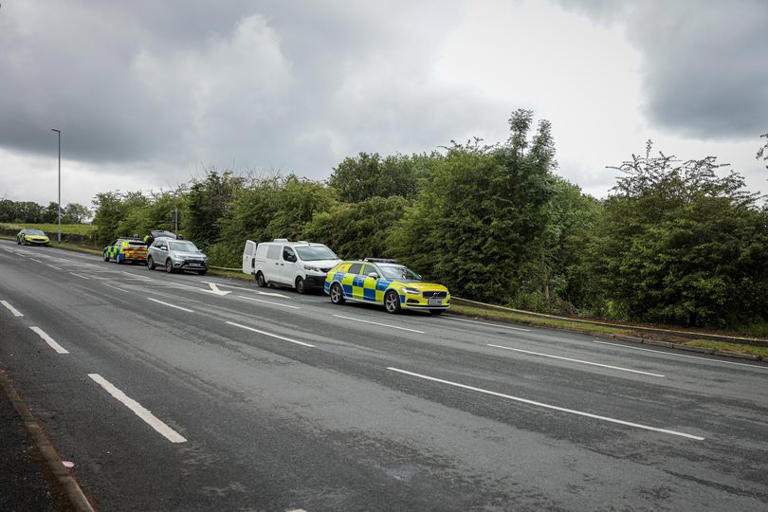Oldham road shut off after car plunges down embankment with police at scene
