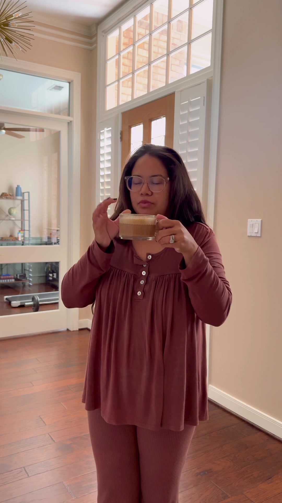 A multitasking mom Monday morning while reviewing a frothy new coffee ...