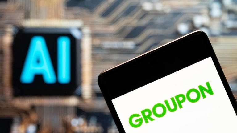 Discount giant Groupon cuts 100s of jobs after customer shift