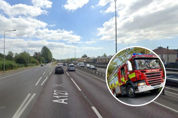 Woman rescued from car after crash with lorry