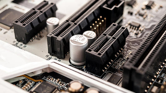 A close-up of a motherboard showing multiple expansion slots.