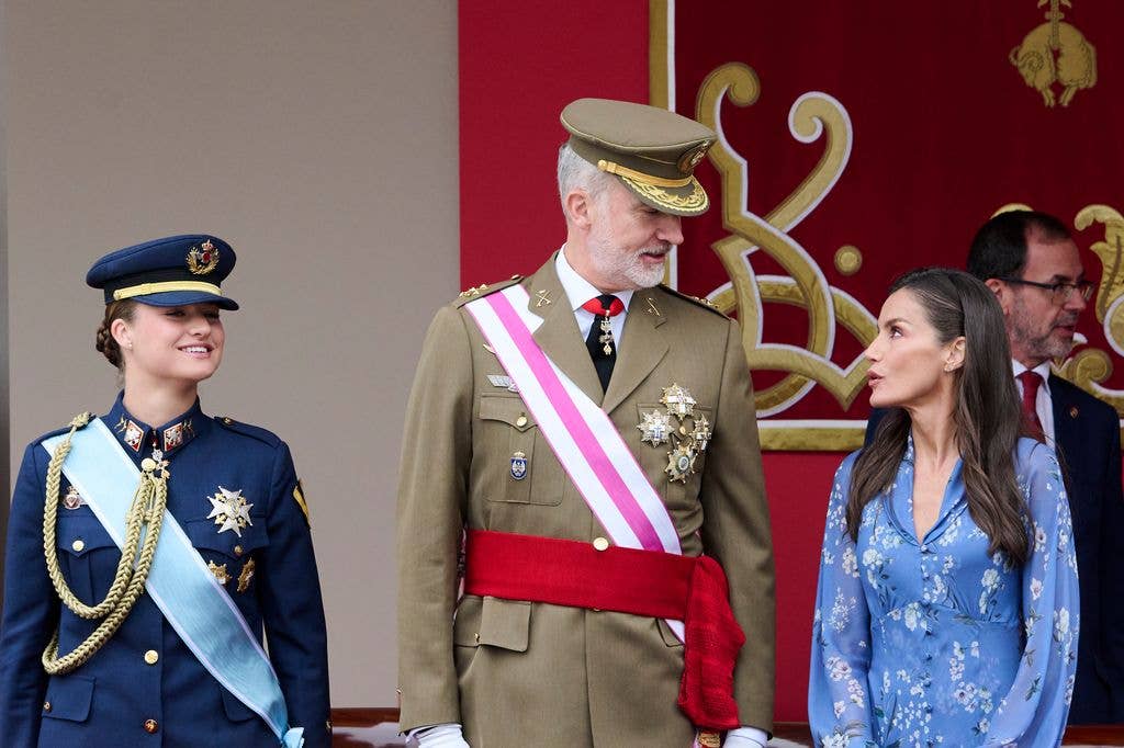 Princess Leonor and King Felipe VI of Spain in their military uniform with Queen Letizia in a blue dress