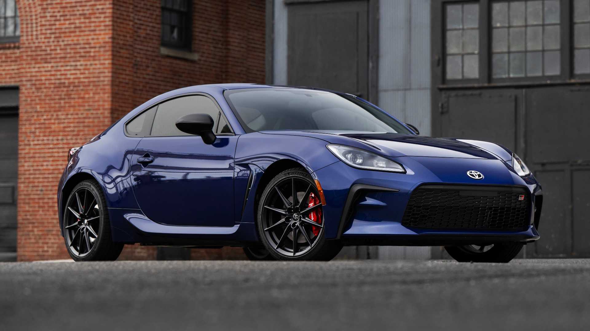 Low angle, front three-quarters static image of the 2027 Toyota GR86 in blue