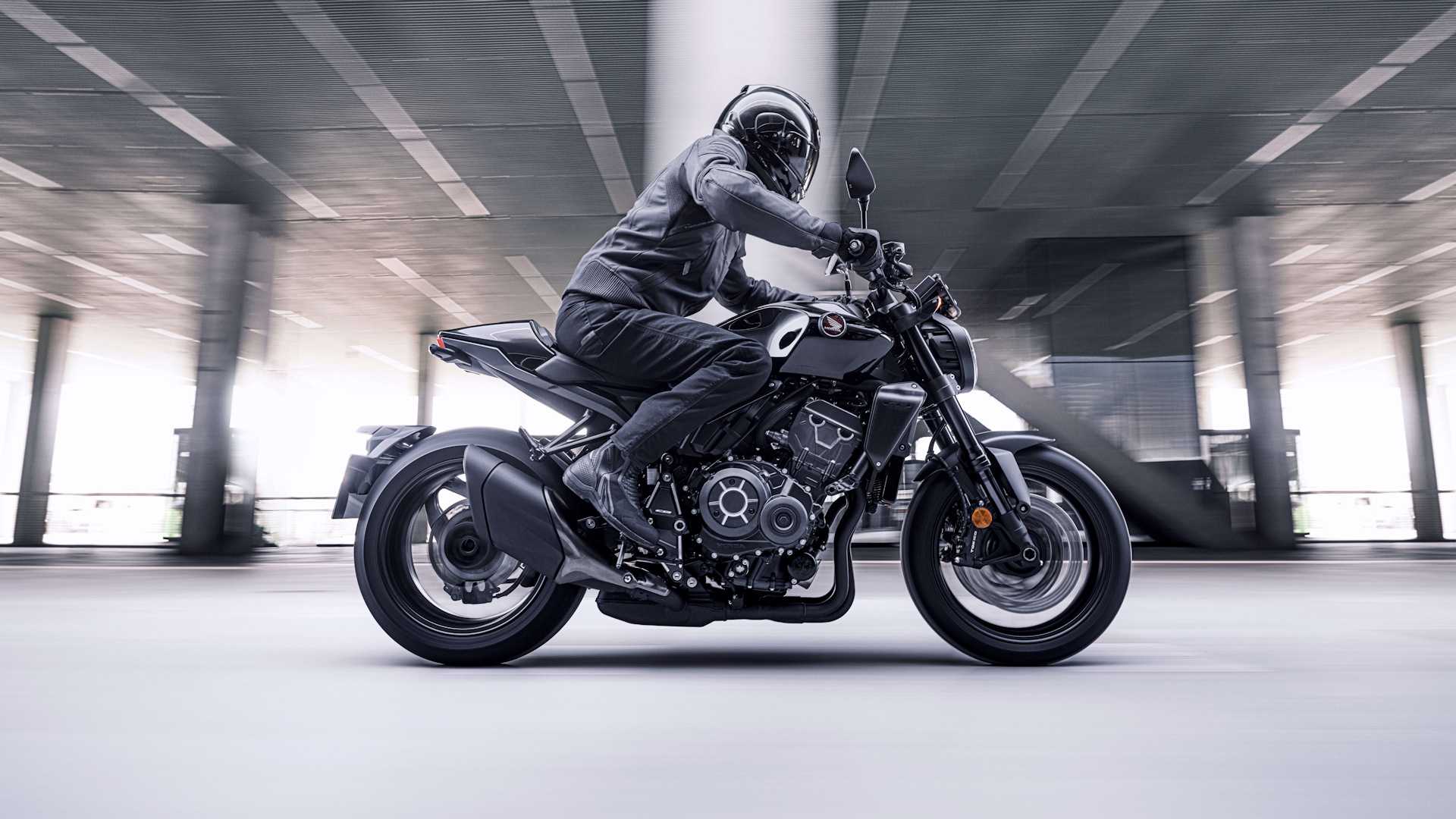 2022 Honda CB1000R cruising through a parking garage
