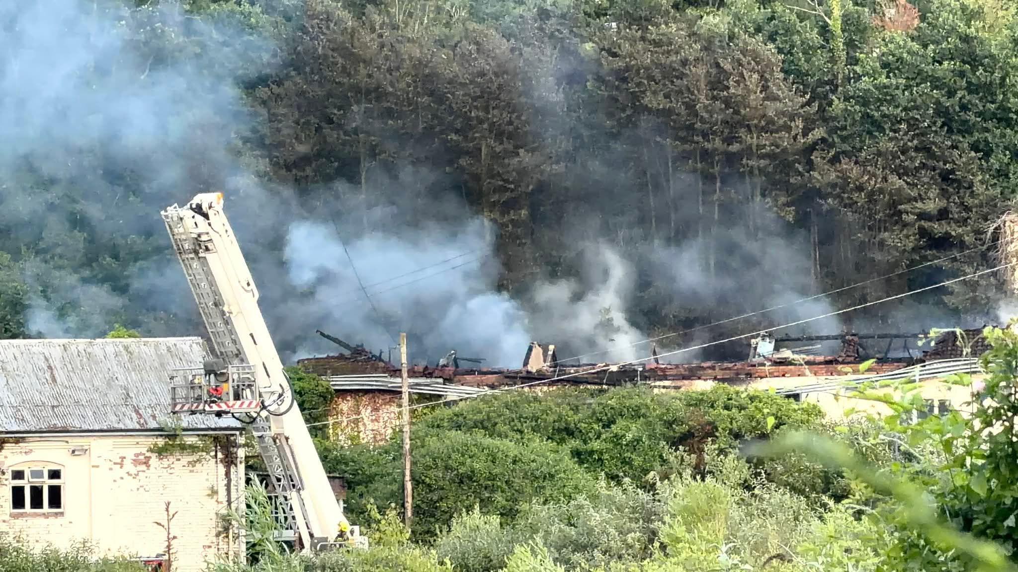 Fire at old paper mill 'started deliberately'